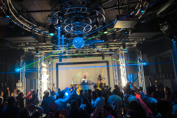 Packed dancefloor at a WeDesi Tokyo Bollywood party — group tickets now live